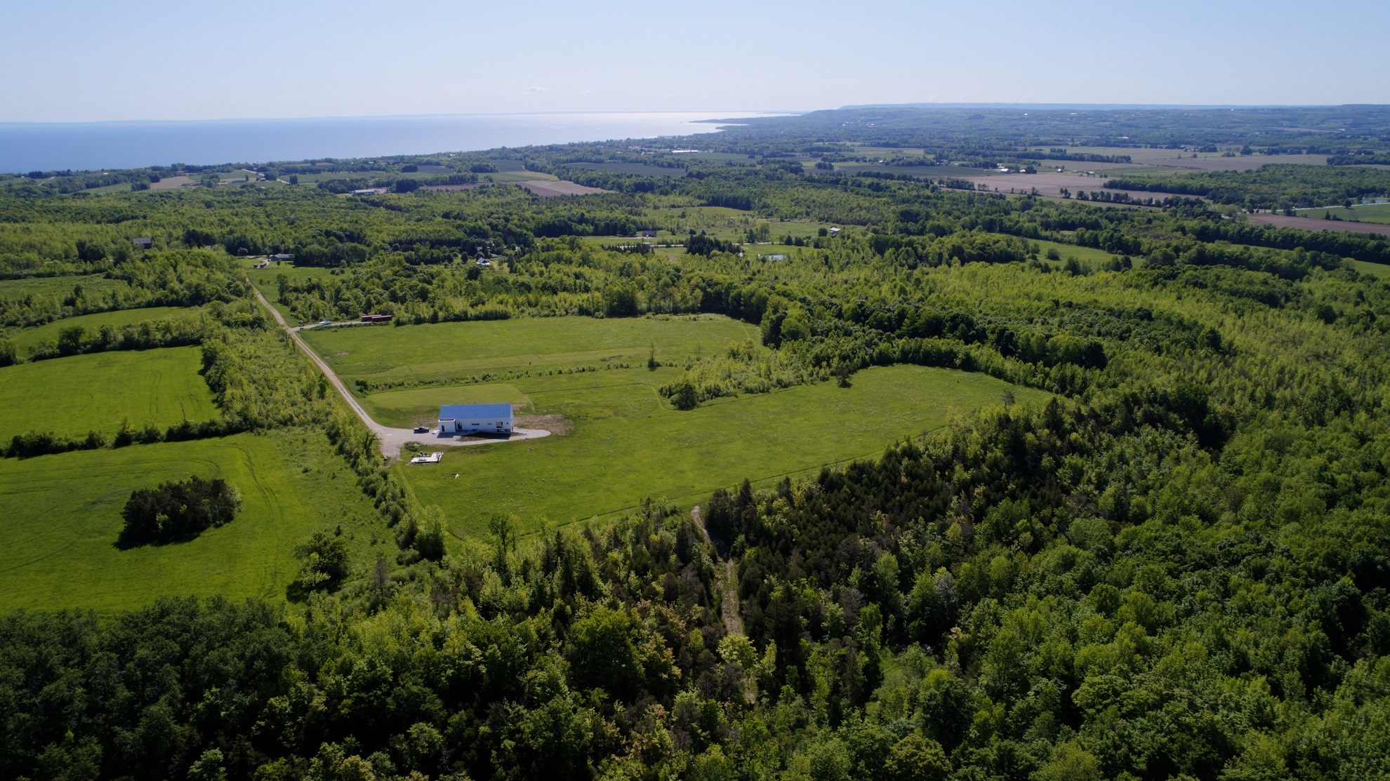 Modern New Construction Scottish Long Home on 37 Acres