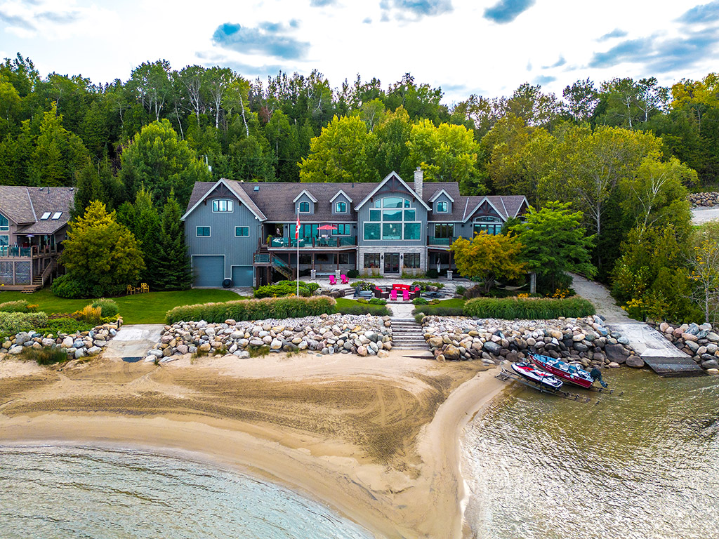 183 Lake Drive-  A private sanctuary of 200 ft of sandy shoreline in Thornbury